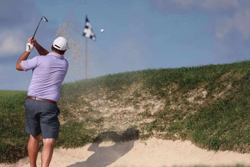 how to hit out of sand